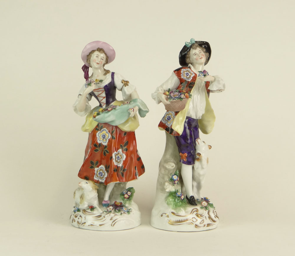 Pair of Antique English Chelsea Painted and Gilt Porcelain Figures.