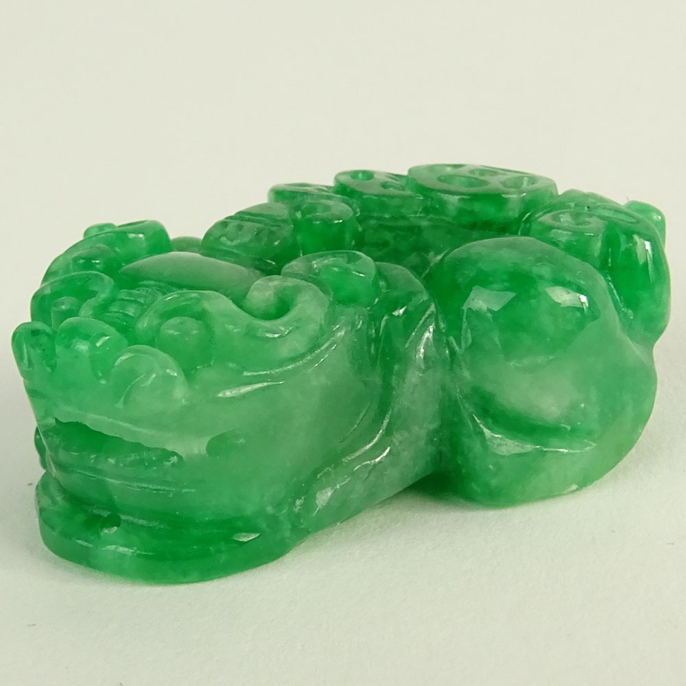 Small Bright Green Jade Carving of a Foo Lion.