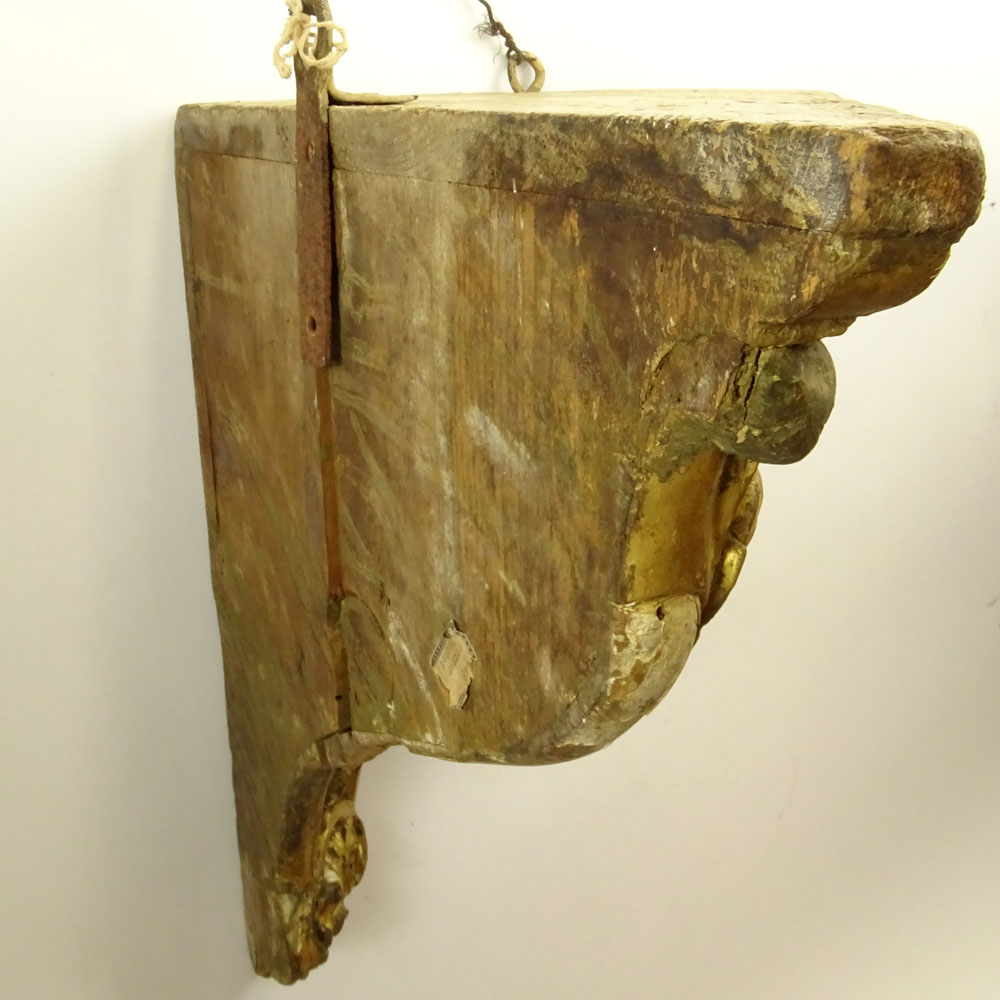 19/20th Century Probably Italian Carved Parcel Gilt Wood Wall Bracket.