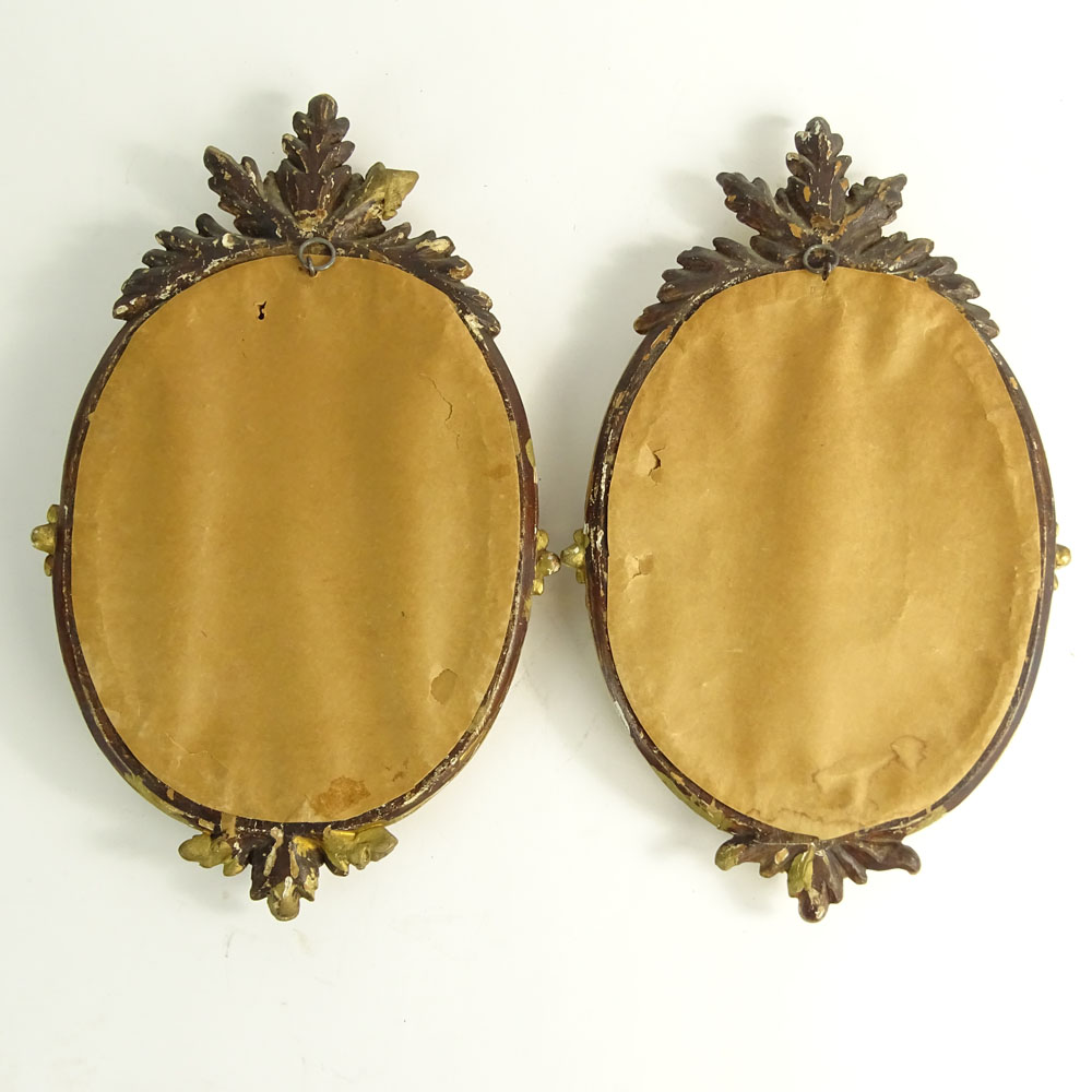 Pair of Vintage Sevres Style Hand Painted Porcelain Plaques in Carved Giltwood Frames.