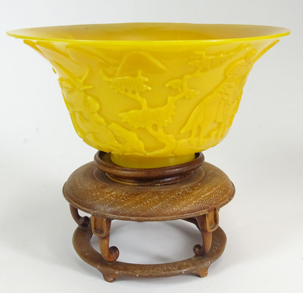 Chinese 19th Century Imperial Yellow Peking Glass Bowl with Carved Mountain Landscape Decoration.