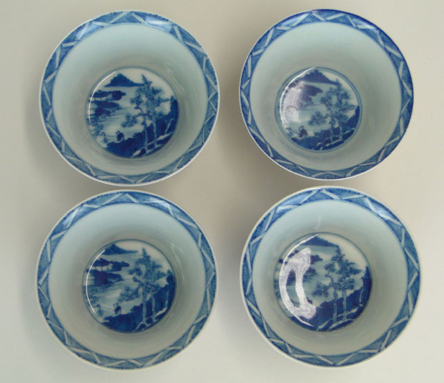 Set of Four (4) 20th Century Chinese Porcelain Wine Cups with Blue and White Decoration.