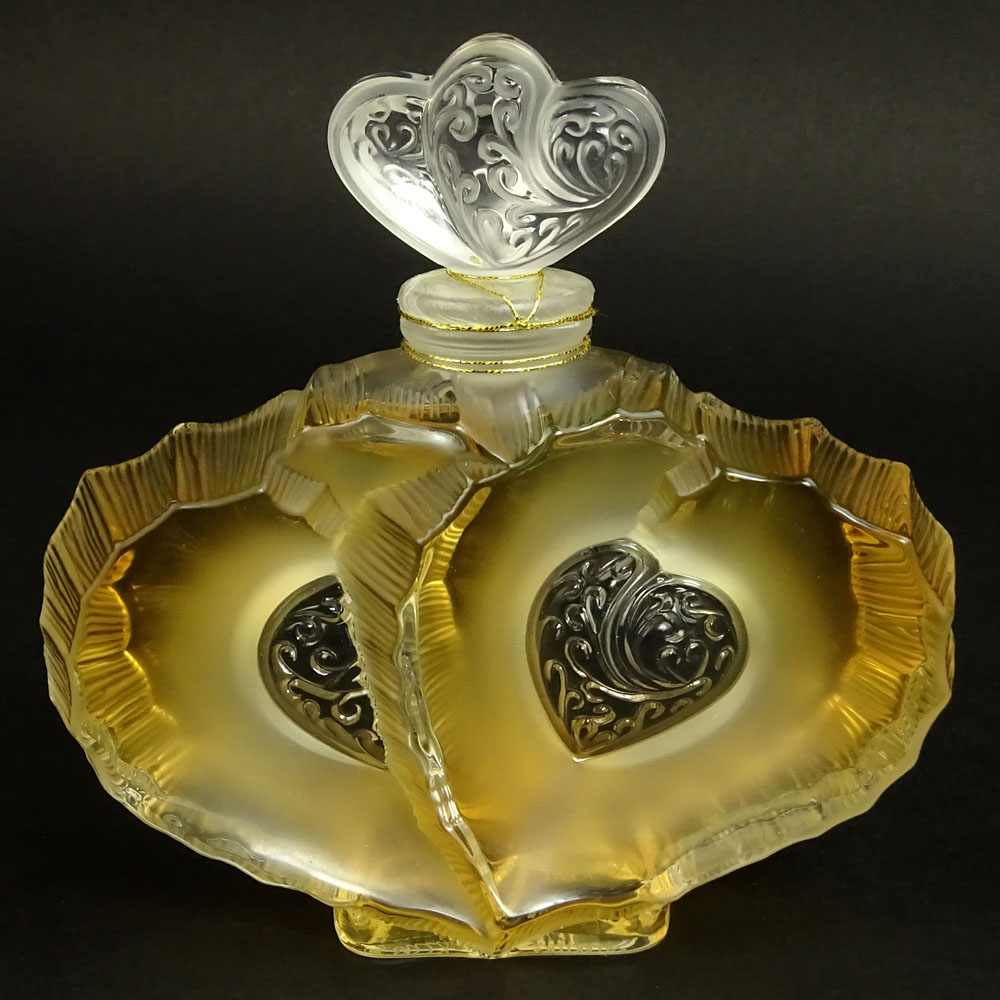 Boxed Lalique 1.7 fl. Oz Eau de Parfum Double Heart Bottle.
