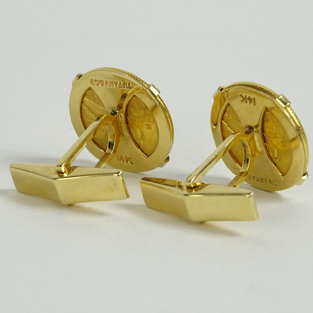 Men's Tiffany & Co 14 Karat Yellow Gold Mounted Indian Head Quarter Eagle Cufflinks.