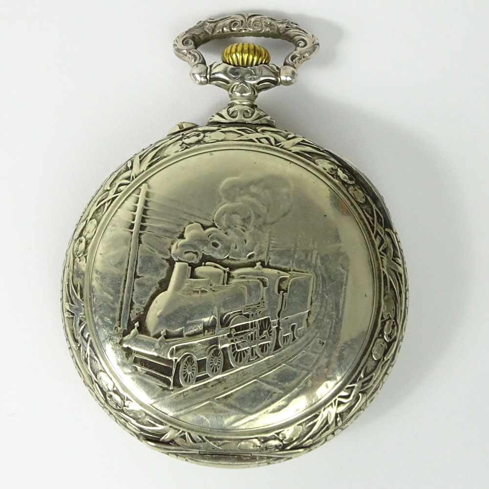 Antique Doxa Erotic Oversize Pocket watch. Chased train design on back of case.