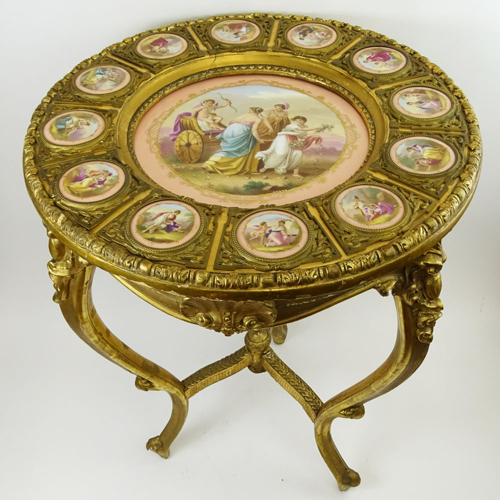 19th Century French Bronze Mounted Giltwood Table With 12 inset Sevres Porcelain Portrait Plaques.