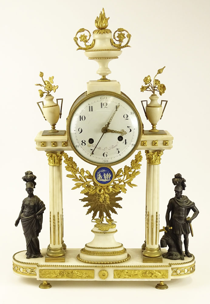 Third quarter 18th century French Gavelle L'Aine Louis XVI ormolu mounted white marble striking portico clock.