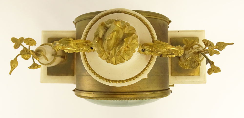 Third quarter 18th century French Gavelle L'Aine Louis XVI ormolu mounted white marble striking portico clock.