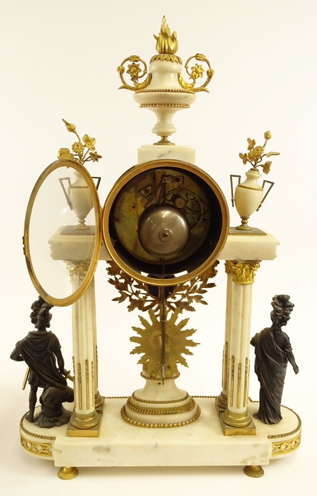Third quarter 18th century French Gavelle L'Aine Louis XVI ormolu mounted white marble striking portico clock.