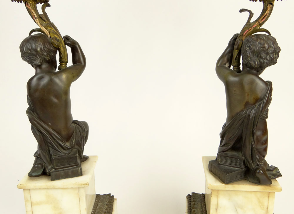 Pair of Antique French Bronze and Marble Figural Six Light Candelabra.