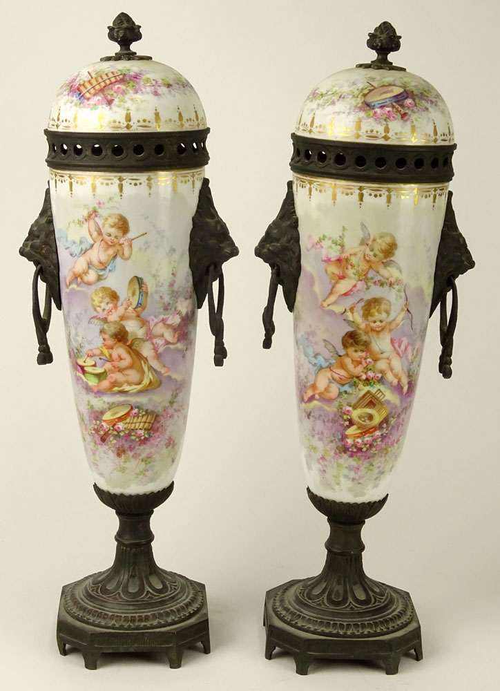 Pair of 19th Century French Sevres Bronze Mounted  Porcelain Covered Urns.