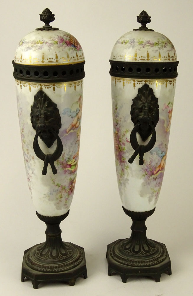 Pair of 19th Century French Sevres Bronze Mounted  Porcelain Covered Urns.