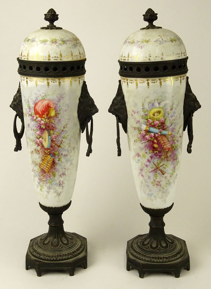 Pair of 19th Century French Sevres Bronze Mounted  Porcelain Covered Urns.