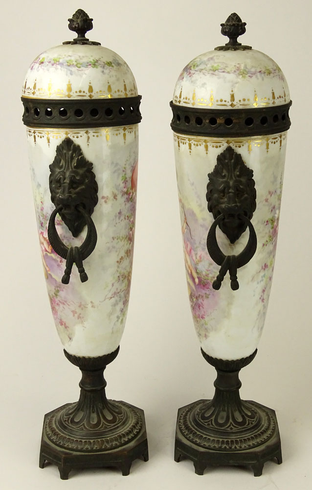 Pair of 19th Century French Sevres Bronze Mounted  Porcelain Covered Urns.