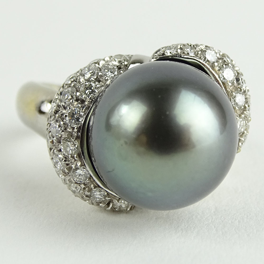 Vintage 12.5mm Tahitain Black Pearl, 1.0 Carat Pave Set Round Cut Diamond and 14 Karat White Gold Ring. 