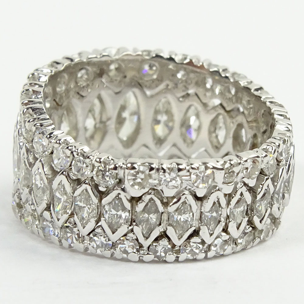 Approx. 4.0 Carat Marquise and Round Cut Diamond and Platinum Ring.