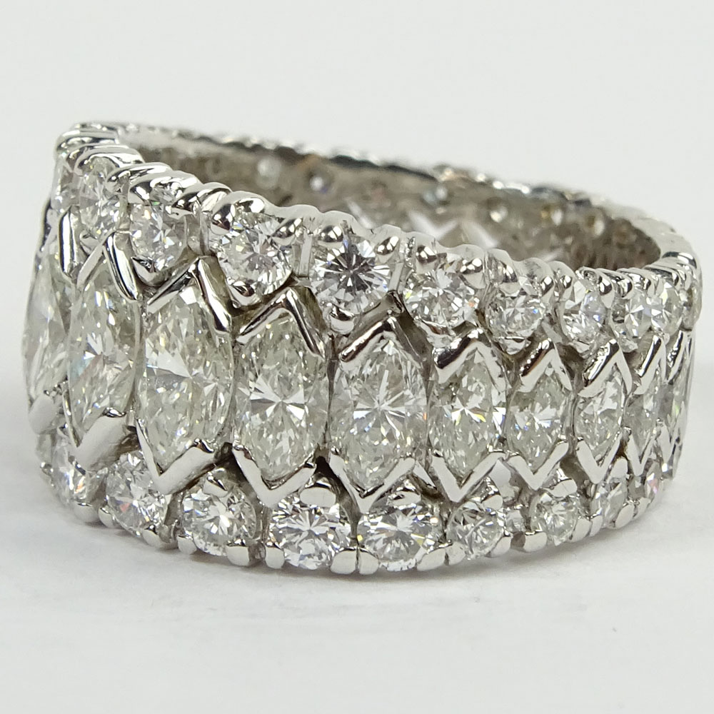 Approx. 4.0 Carat Marquise and Round Cut Diamond and Platinum Ring.