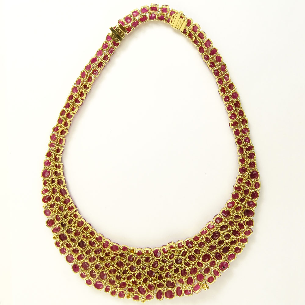 Approx. 250.00 Carat Cabochon Ruby, 2.50 Carat Diamond and 18 Karat Yellow Gold Necklace. 