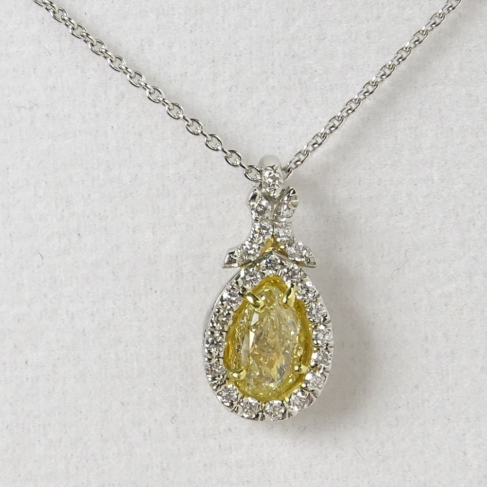 EGL Certified 1.01 Carat Pear Shape Fancy Yellow Diamond and Platinum Pendant Necklace.