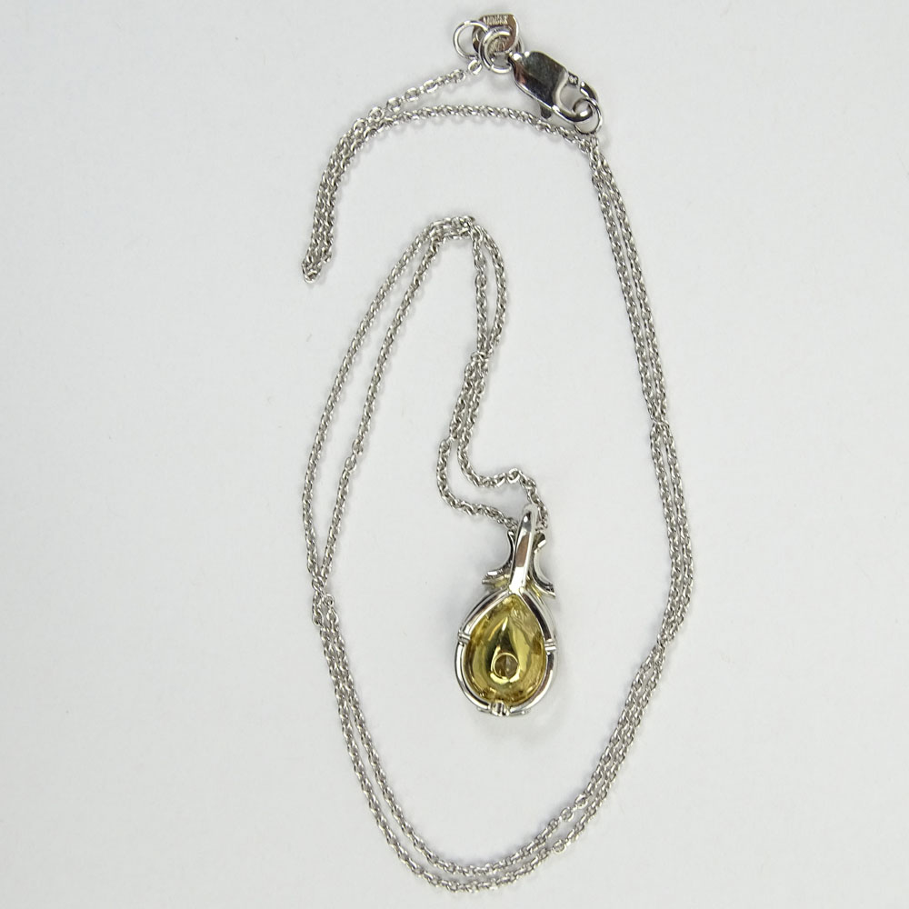 EGL Certified 1.01 Carat Pear Shape Fancy Yellow Diamond and Platinum Pendant Necklace.