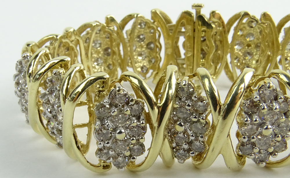 Lady's Vintage 10 Karat Yellow Gold and Diamond Cluster Bracelet.