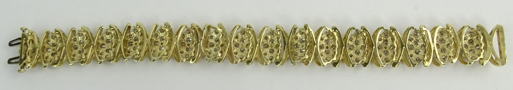 Lady's Vintage 10 Karat Yellow Gold and Diamond Cluster Bracelet.