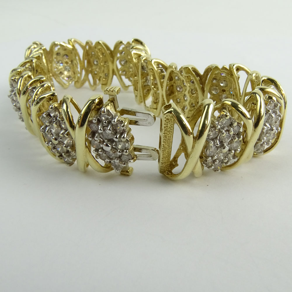 Lady's Vintage 10 Karat Yellow Gold and Diamond Cluster Bracelet.