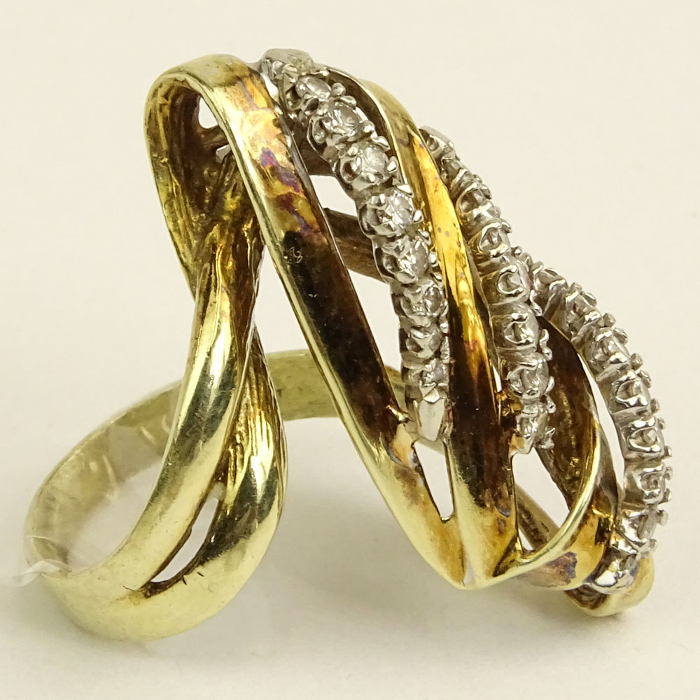 Lady's Vintage 14 Karat Yellow Gold Ring accented with small round cut diamonds.