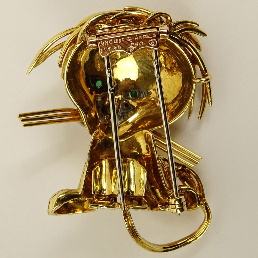 Circa 1960's Van Cleef and Arpels 18 Karat Yellow Gold, Diamond, Emerald and Enamel Lion Brooch.