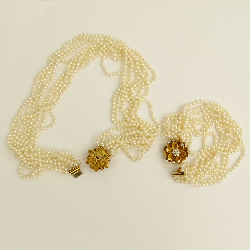 Multi Strand White Pearl Necklace and Bracelet Suite each with 18 Karat Yellow Gold and Diamond Clasp.