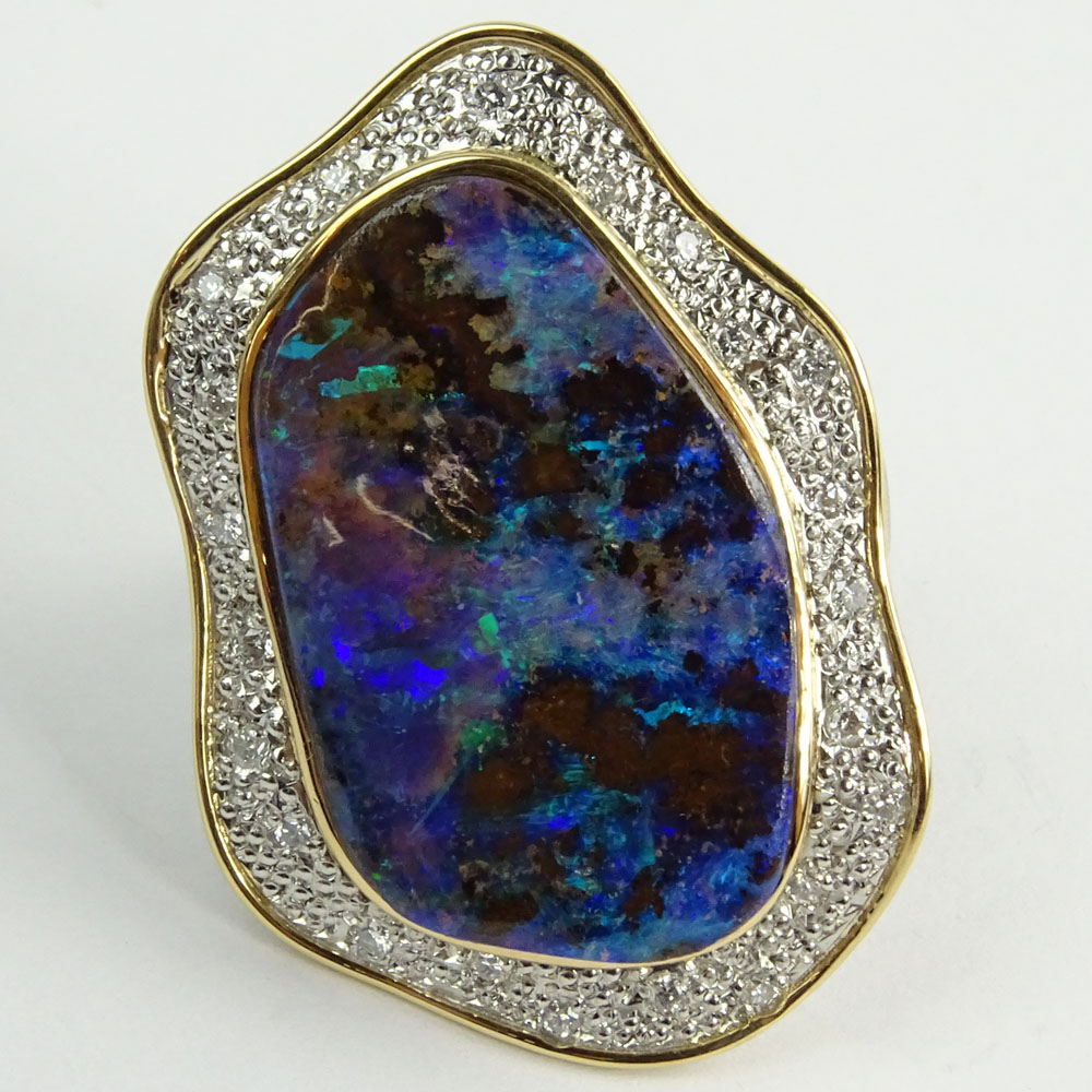 Large Black Opal, Pave Set Round Cut Diamond, Platinum and 18 Karat Yellow Gold Ring. 