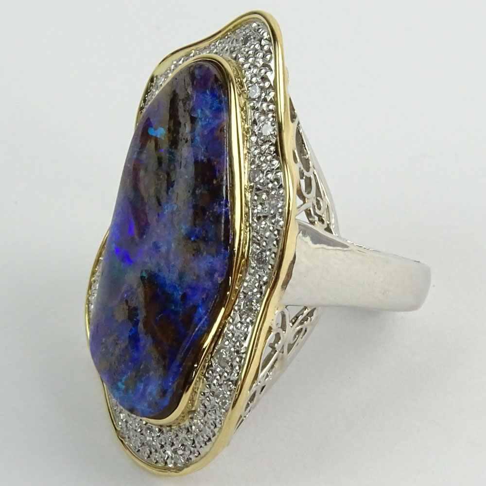 Large Black Opal, Pave Set Round Cut Diamond, Platinum and 18 Karat Yellow Gold Ring. 