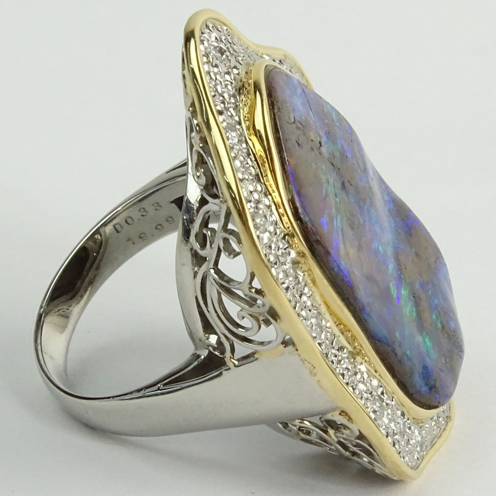 Large Black Opal, Pave Set Round Cut Diamond, Platinum and 18 Karat Yellow Gold Ring. 