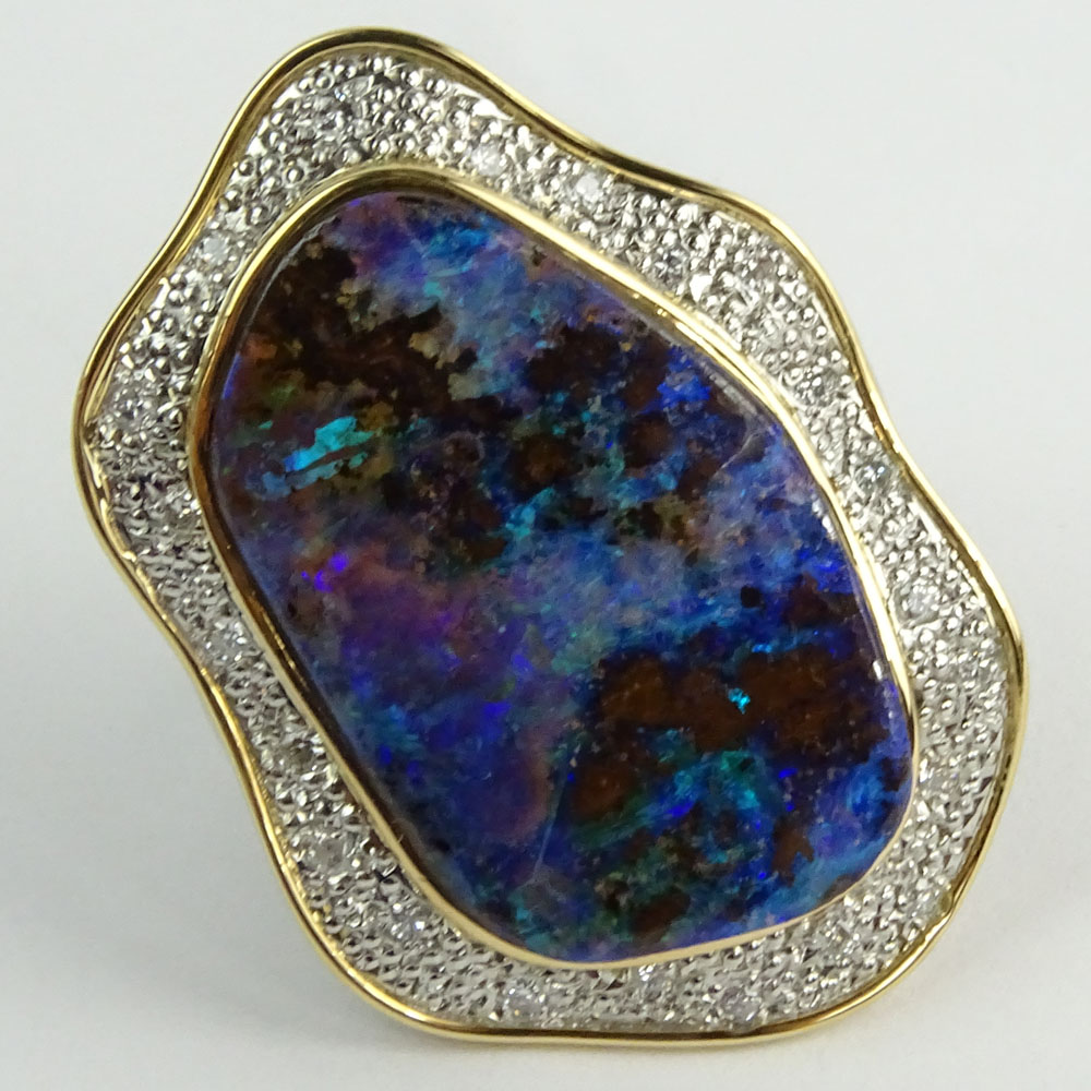 Large Black Opal, Pave Set Round Cut Diamond, Platinum and 18 Karat Yellow Gold Ring. 