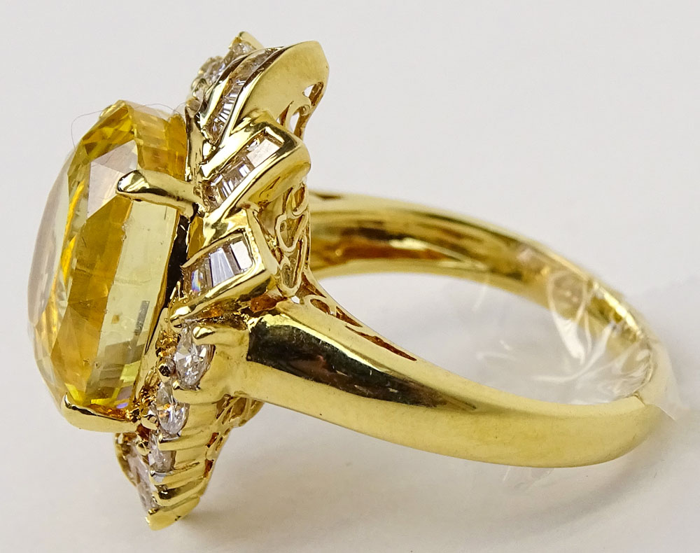 Approx. 14.07 Carat Oval Cut Sapphire, 1.05 Carat Diamond and 18 Karat Yellow Gold Ring.