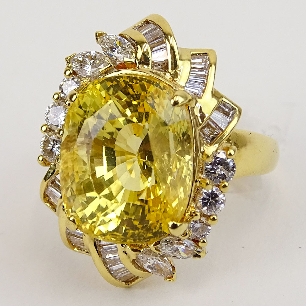Approx. 14.07 Carat Oval Cut Sapphire, 1.05 Carat Diamond and 18 Karat Yellow Gold Ring.