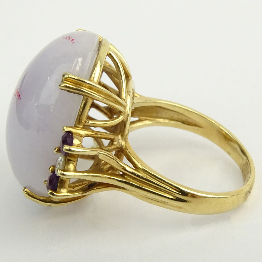 Vintage Lavender Jade and 14 Karat Yellow Gold Ring with Diamond and Sapphire accents.