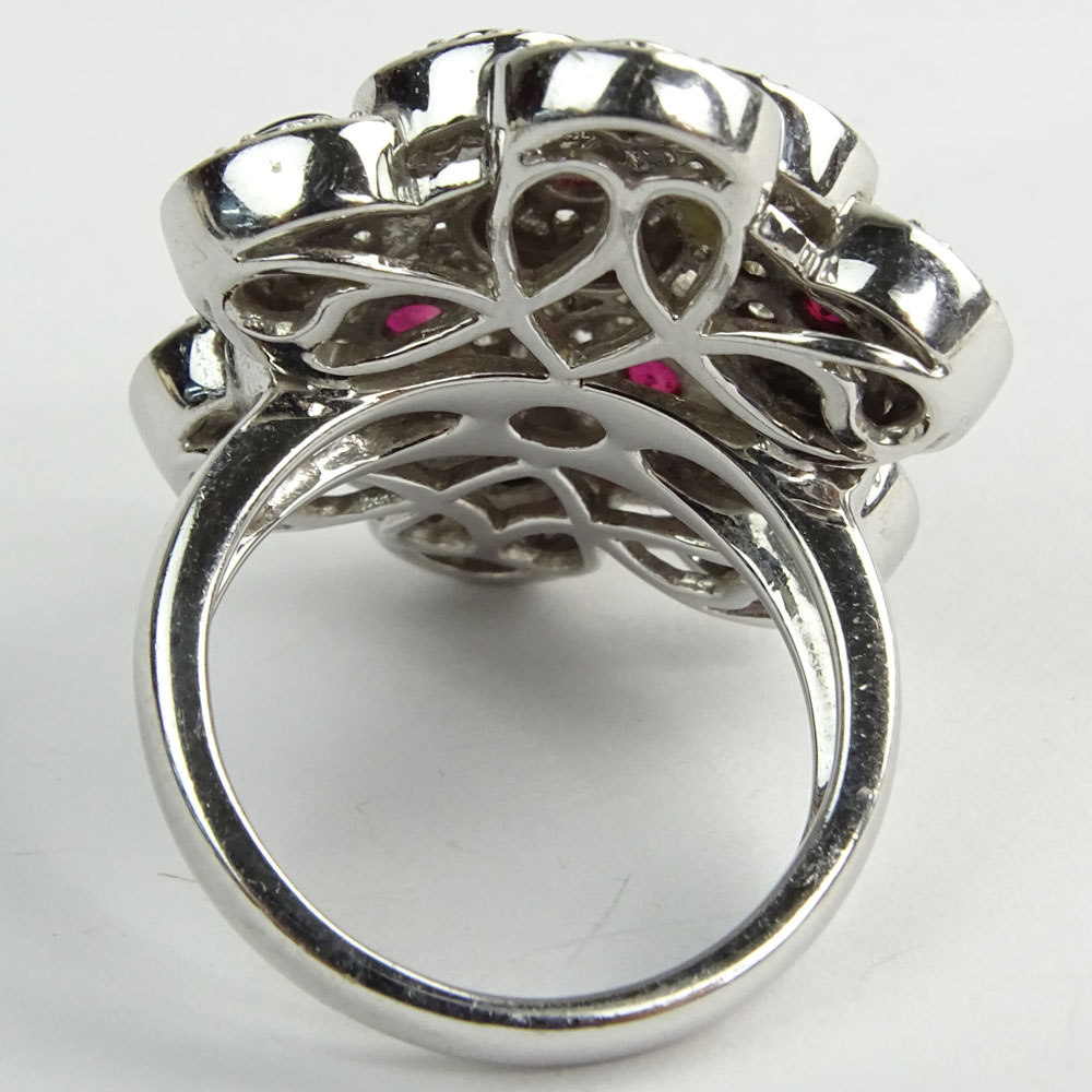 Diamond, Ruby, Black Onyx and 18 Karat White Gold Ring. 