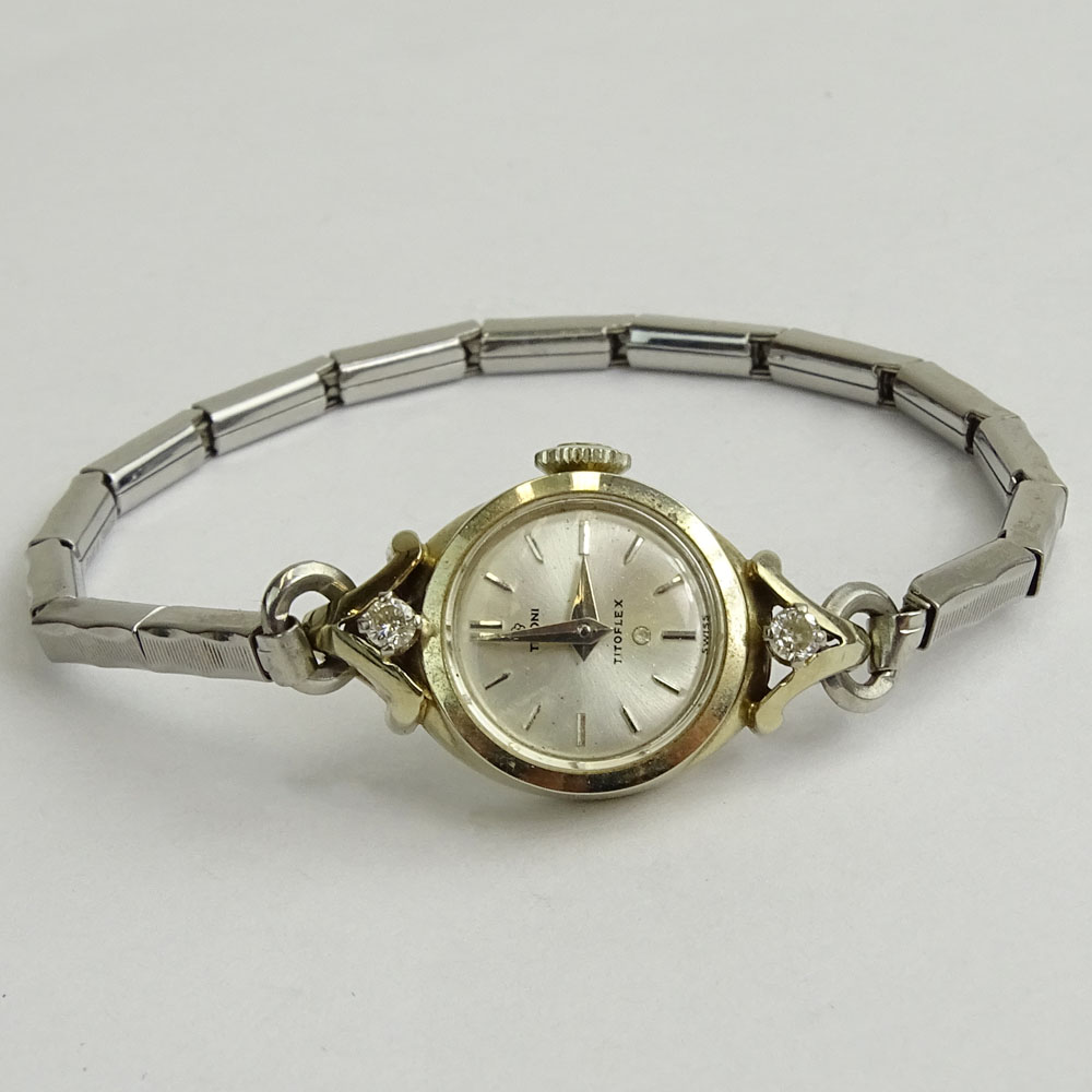 18 Karat White Gold and Diamond Tittoni Manual Movement Watch with Gold Filled Bracelet.