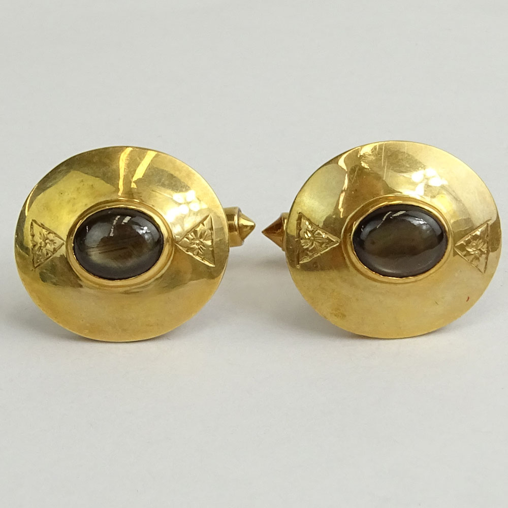 Pair of Vintage Black Star Sapphire and 14 Karat Yellow Gold Cufflinks.