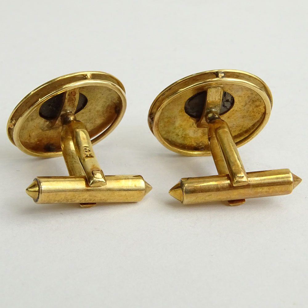 Pair of Vintage Black Star Sapphire and 14 Karat Yellow Gold Cufflinks.