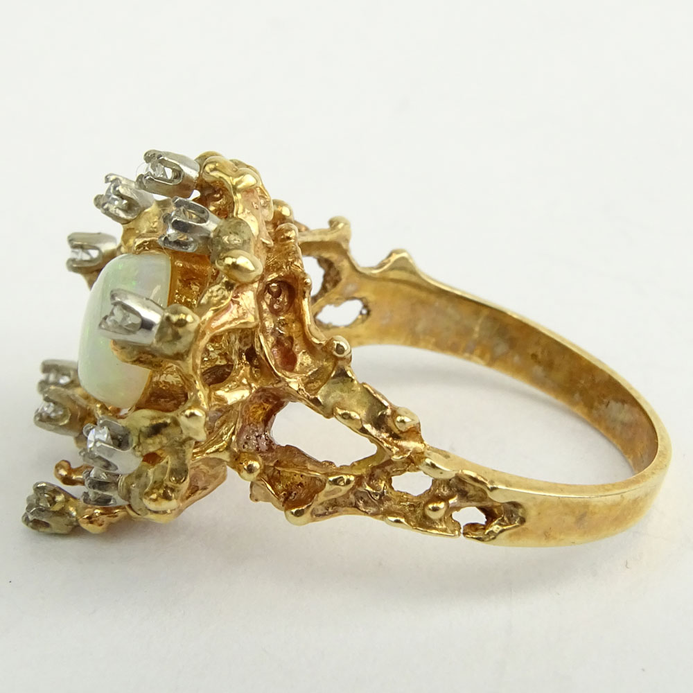 Vintage White Opal and 14 Karat Yellow Gold Ring with small diamond accents.