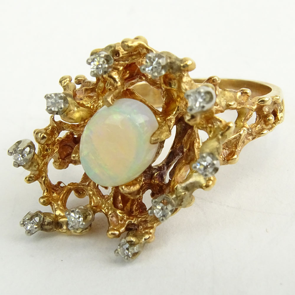 Vintage White Opal and 14 Karat Yellow Gold Ring with small diamond accents.