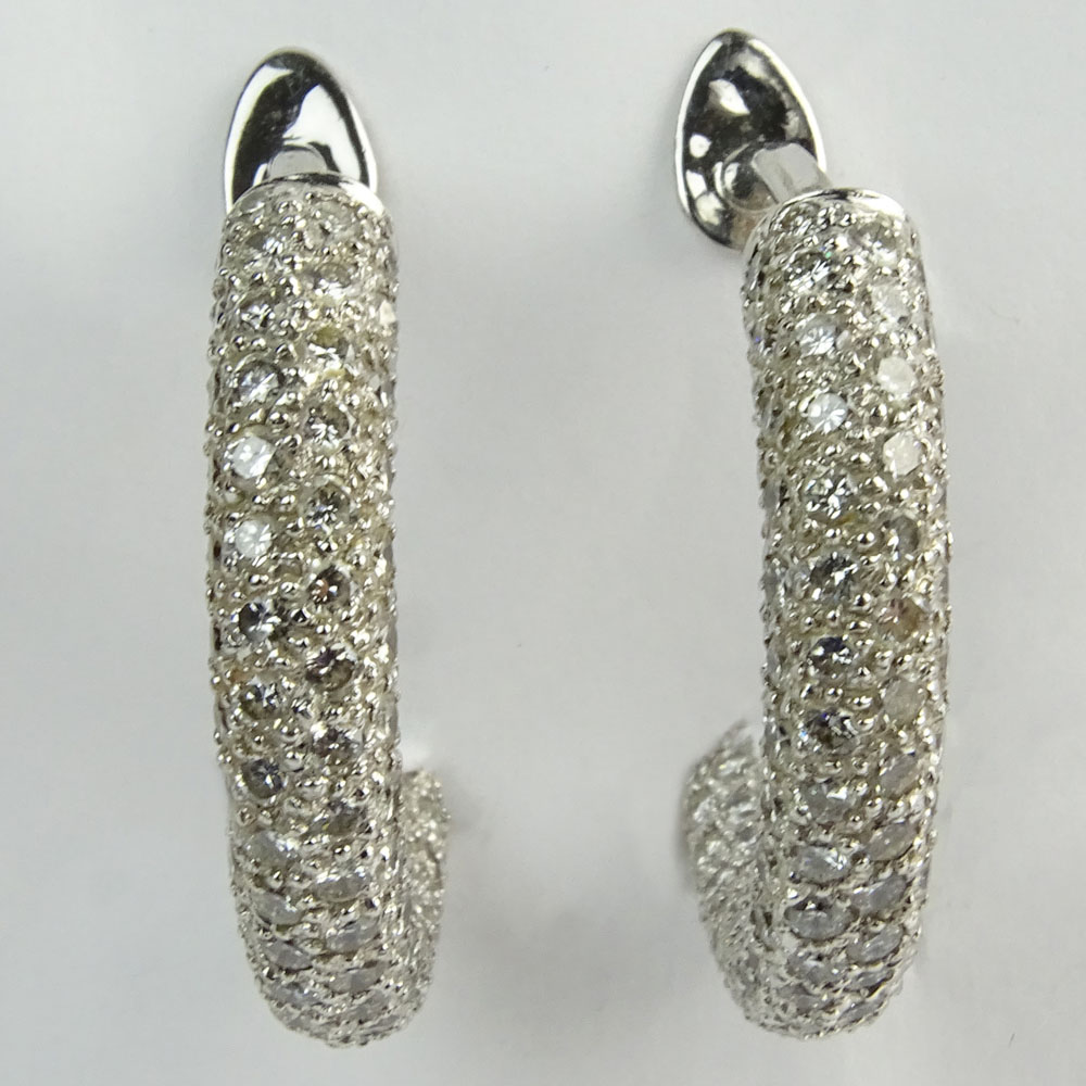 Impressive Pair of 13.80 Carat Pave Set Round Cut Diamond and 18 Karat White Gold Hoop Earrings.