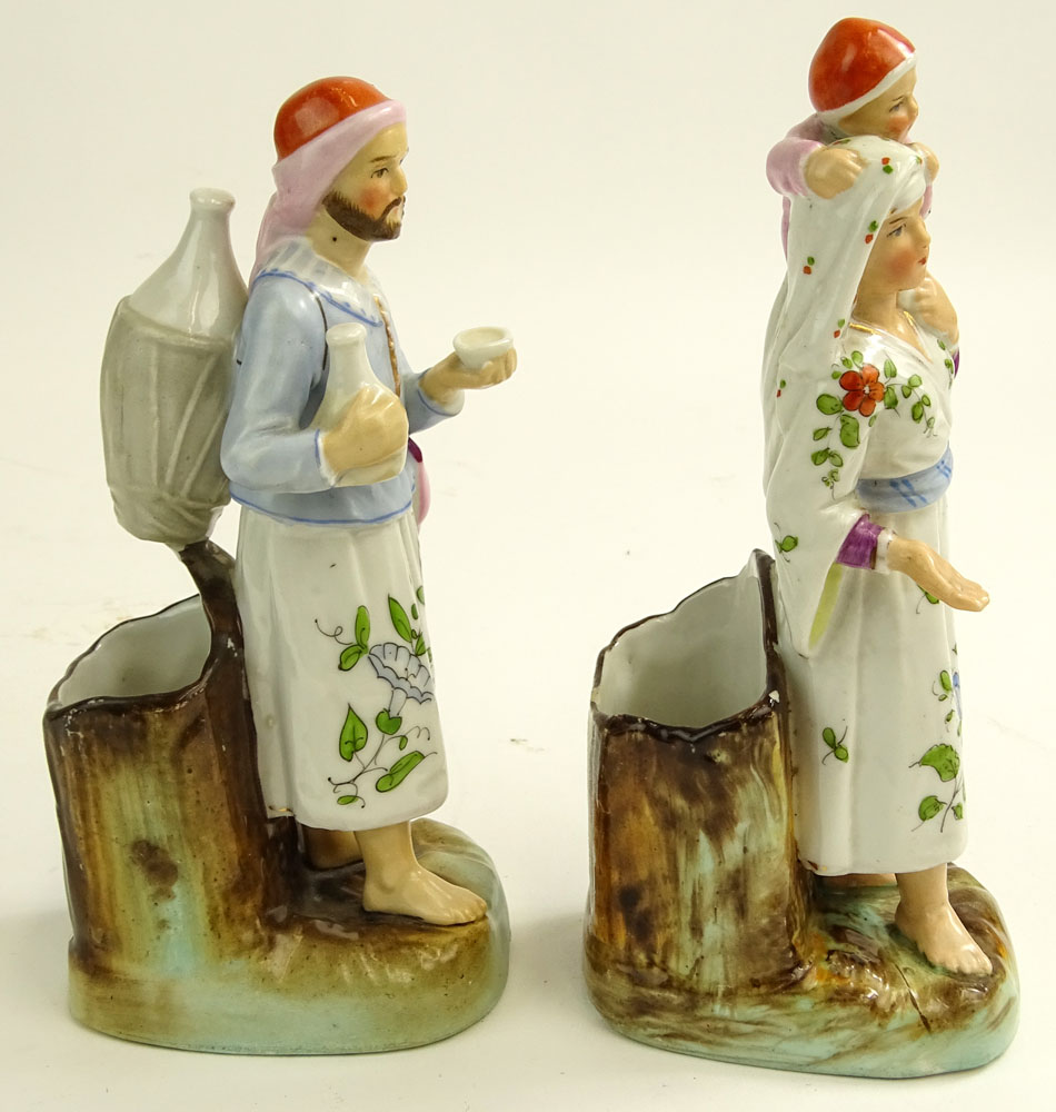 Pair of Vintage Turkish Hand Painted Porcelain Figural Vases. Man and woman with child.