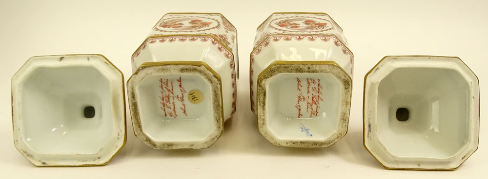 Pair of French Porcelain Hand Decorated Covered Footed Jars.