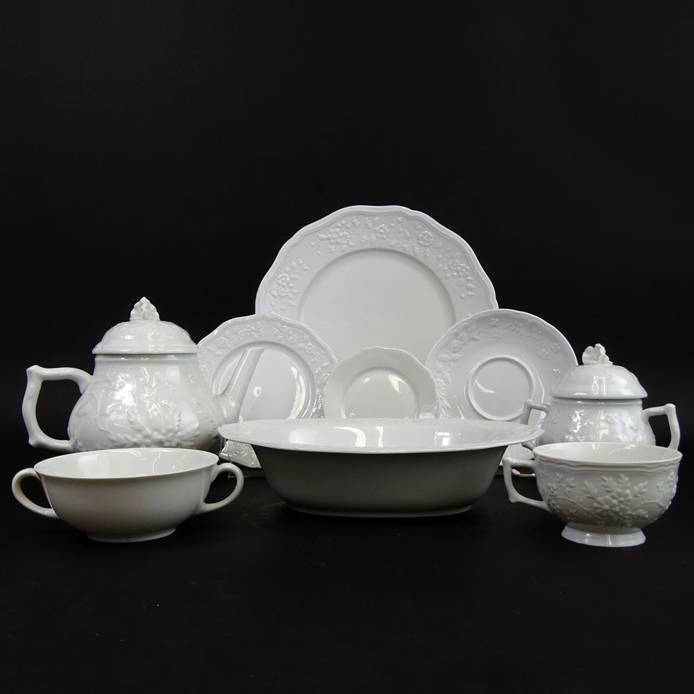 A sixty-three (63) piece set of CERALENE dinnerware by Limoges.