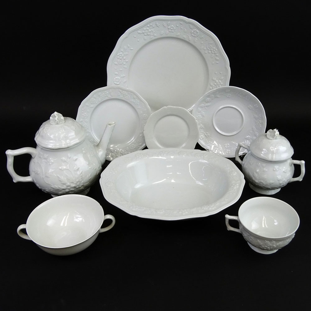 A sixty-three (63) piece set of CERALENE dinnerware by Limoges.