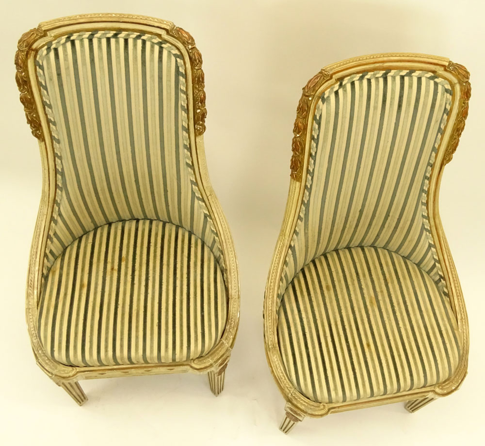Pair of Mid 20th Century Italian Neoclassical style Carved Painted and Parcel Gilt Side Chairs.
