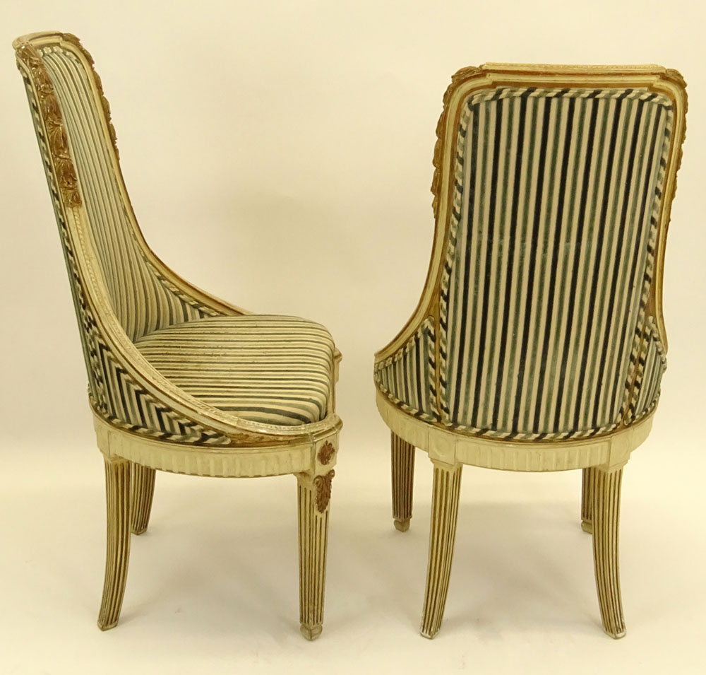 Pair of Mid 20th Century Italian Neoclassical style Carved Painted and Parcel Gilt Side Chairs.